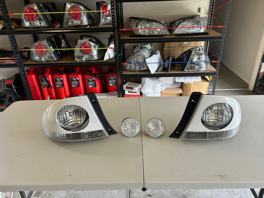 TOYOTA ALTEZZA/LEXUS IS200 CLEAR TAIL LIGHTS WITH GENUINE TRD COVERS AND CLEAR TRUNK LIGHT COMBO